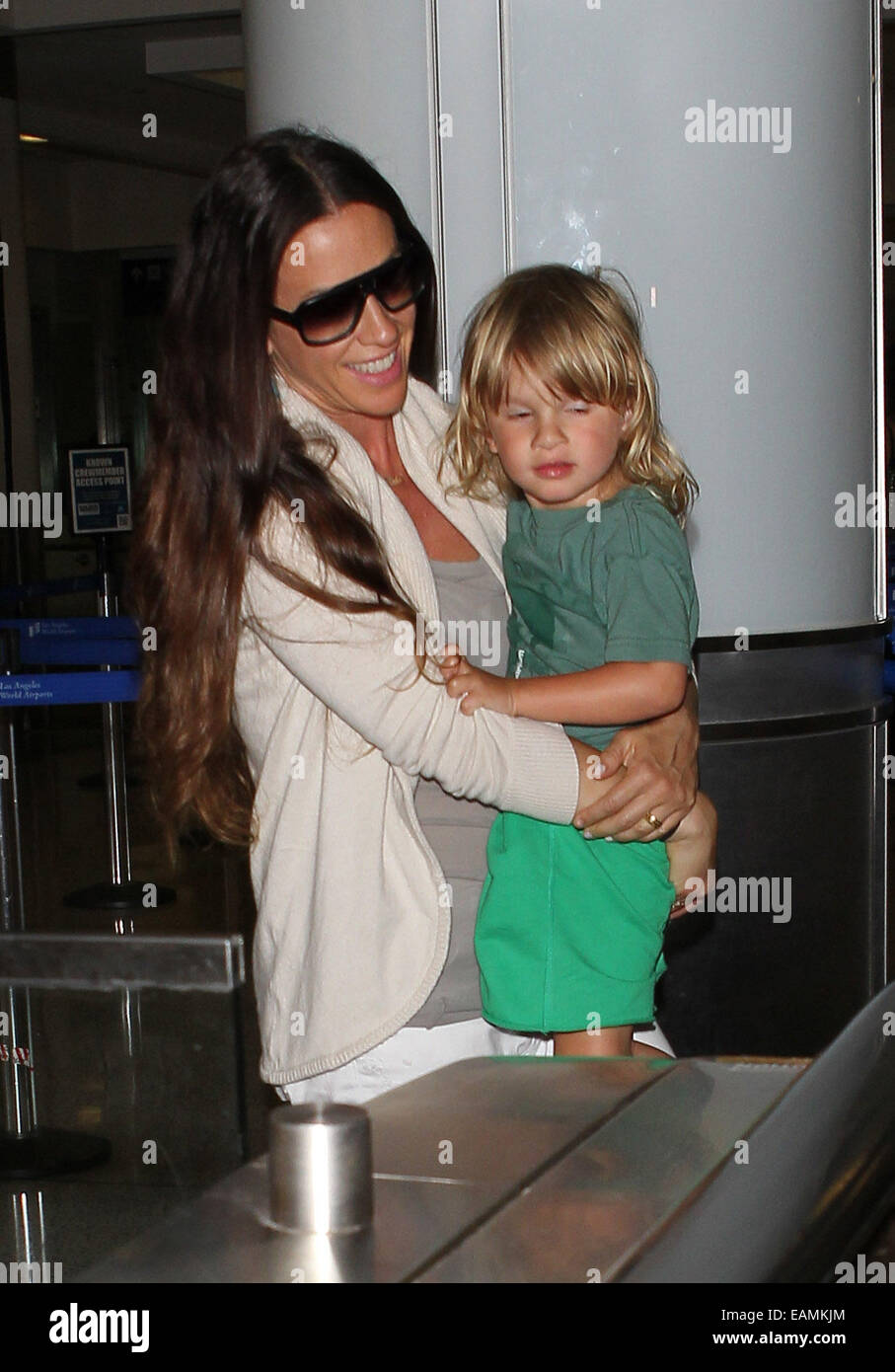 Alanis Morissette and her husband Mario “Souleye” Treadway arrive at