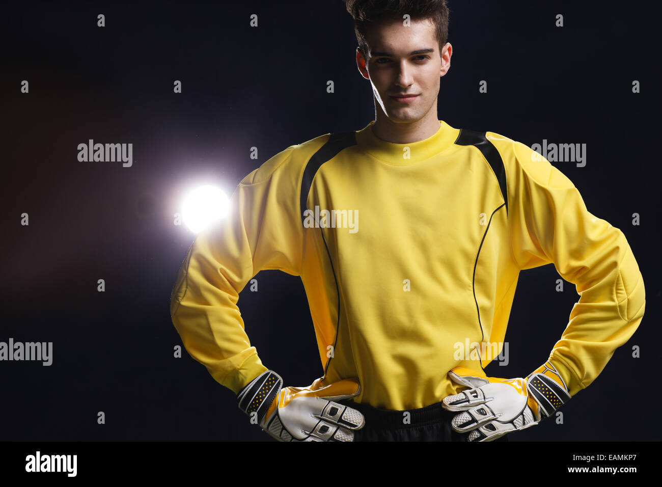 Man with hands on hips looking up hires stock photography and images