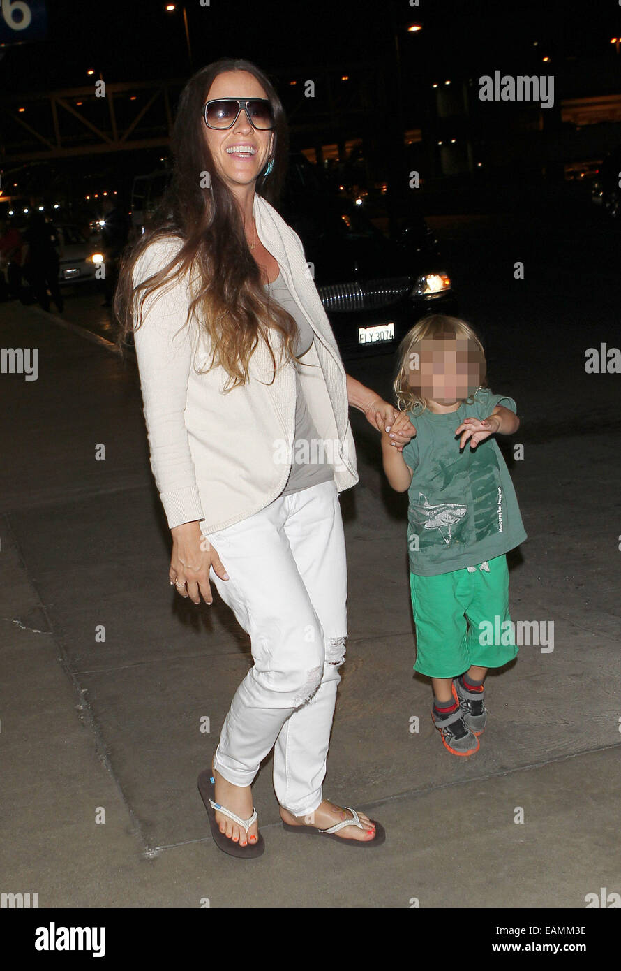 Alanis Morissette and her husband Mario “Souleye” Treadway arrive at