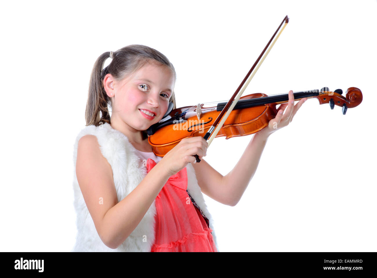 a pretty little girl playing the violin on the white background Stock ...