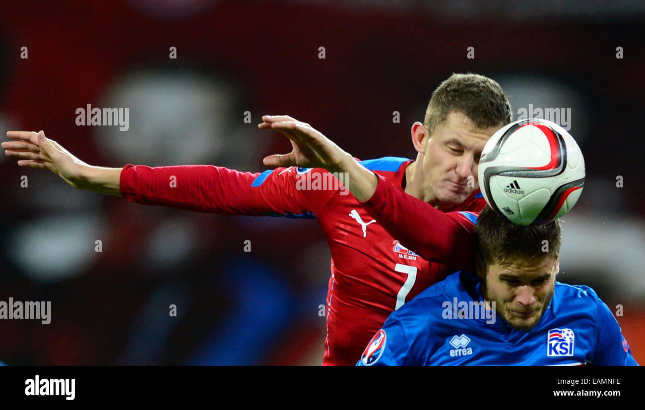 Tomas Necid of the Czech Republic (left) and Rurik Gislason of Iceland during the European Championship qualification match, Group A in Pilsen, Czech Republic, on Sunday, November 16th, 2014. (CTK Photo/Roman Vondrous) Stock Photo