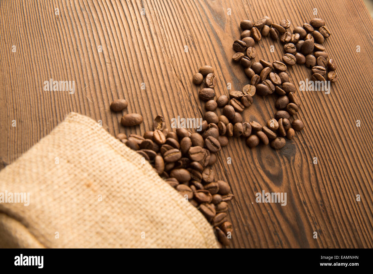 Coffee beans piled into the dollar sign Stock Photo Alamy
