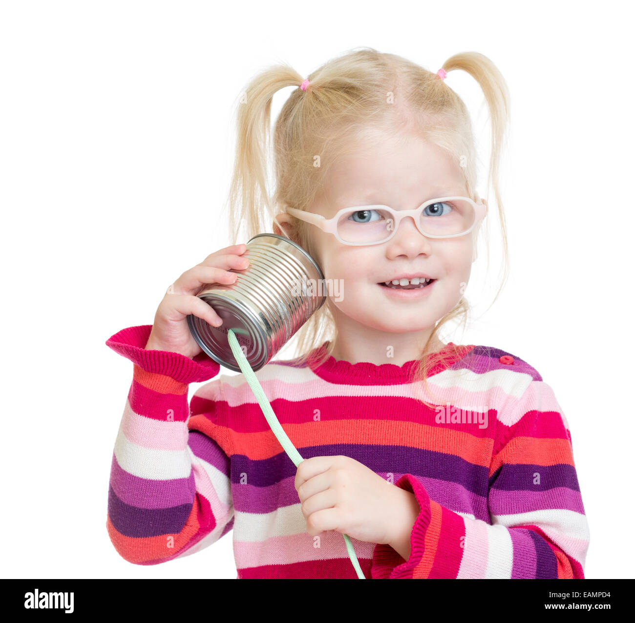Funny kid in eyeglasses with can as a telephone isolated Stock Photo