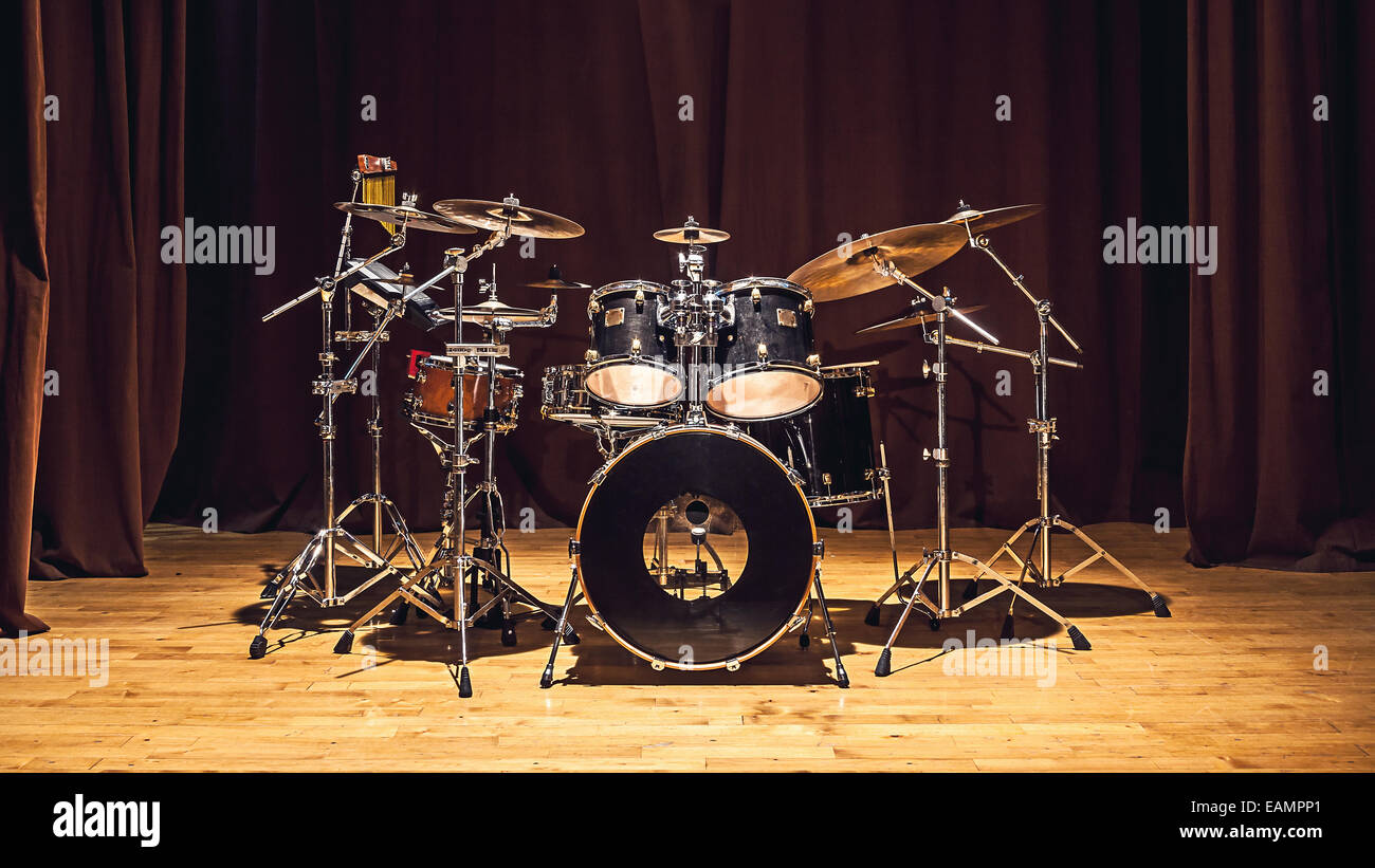 Modern drum set on stage prepared for playing. Stock Photo