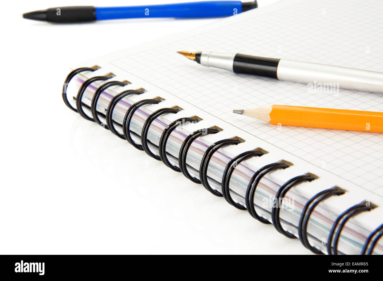 isolated notebook and ink pen on white background Stock Photo - Alamy