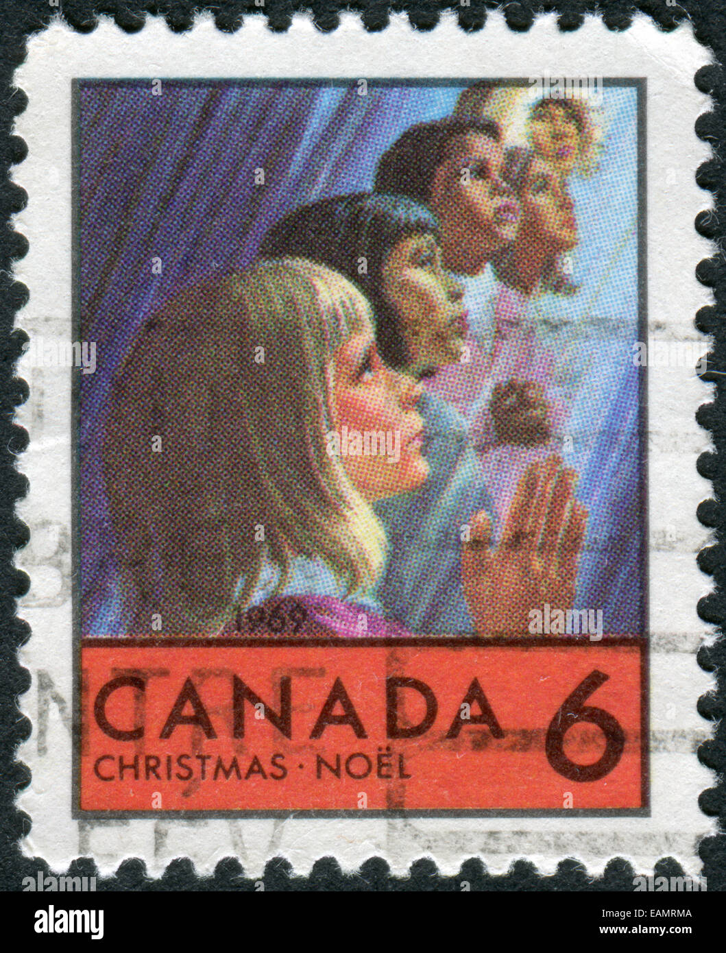 CANADA - CIRCA 1969: Postage stamp printed in Canada, Christmas issue, shows Children of Various races, circa 1969 Stock Photo