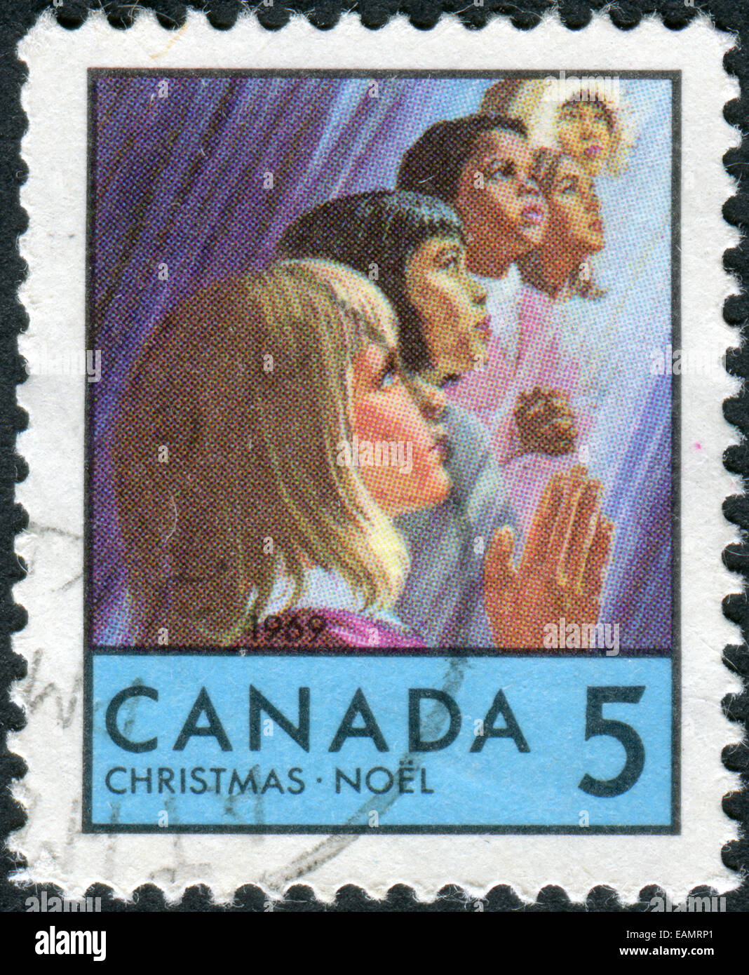 CANADA - CIRCA 1969: Postage stamp printed in Canada, Christmas issue, shows Children of Various races, circa 1969 Stock Photo