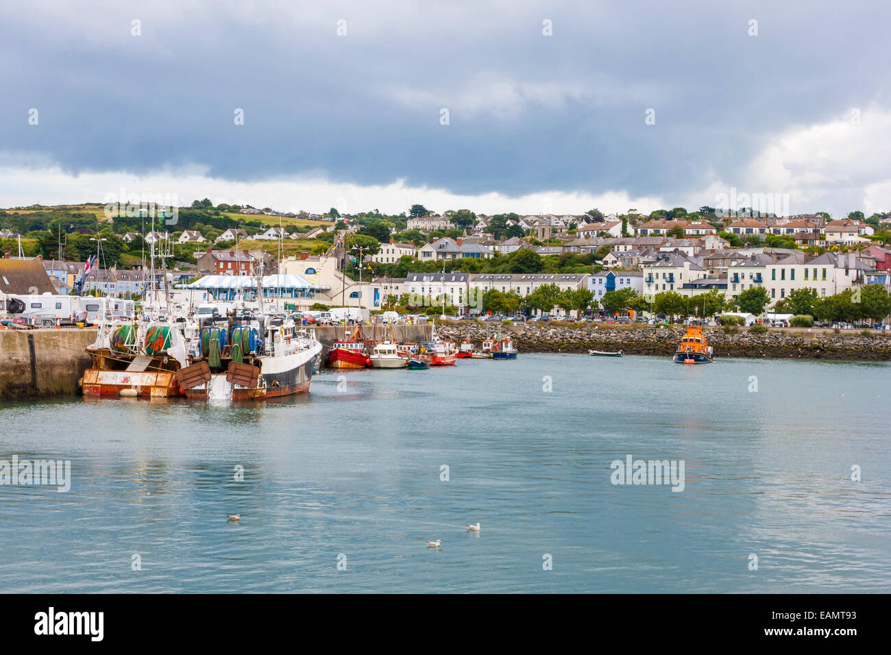 Fishing boat docked in the harbor at Howth Stock Photo Alamy