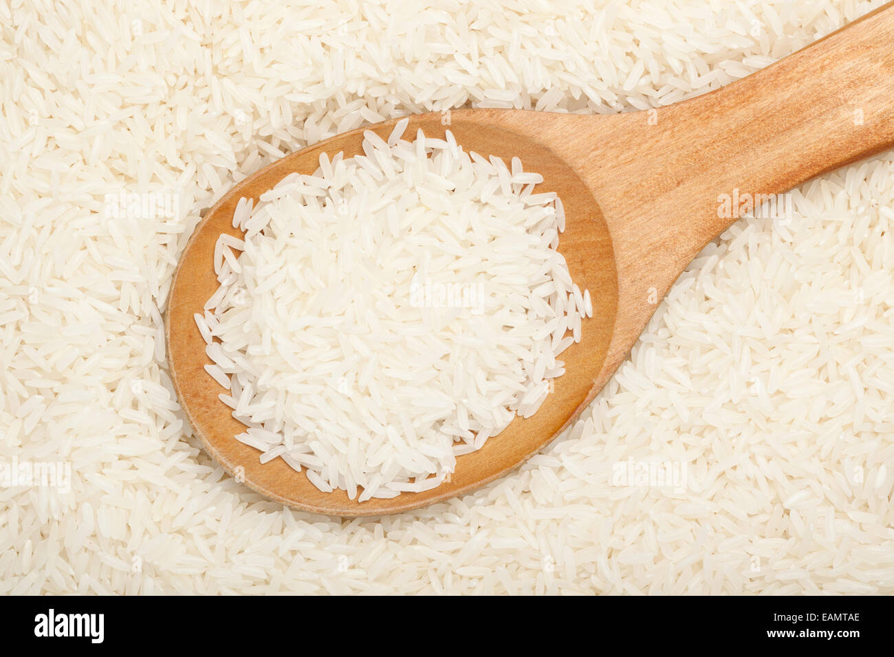 Thai fragrant jasmine rice with wooden spoon Stock Photo Alamy