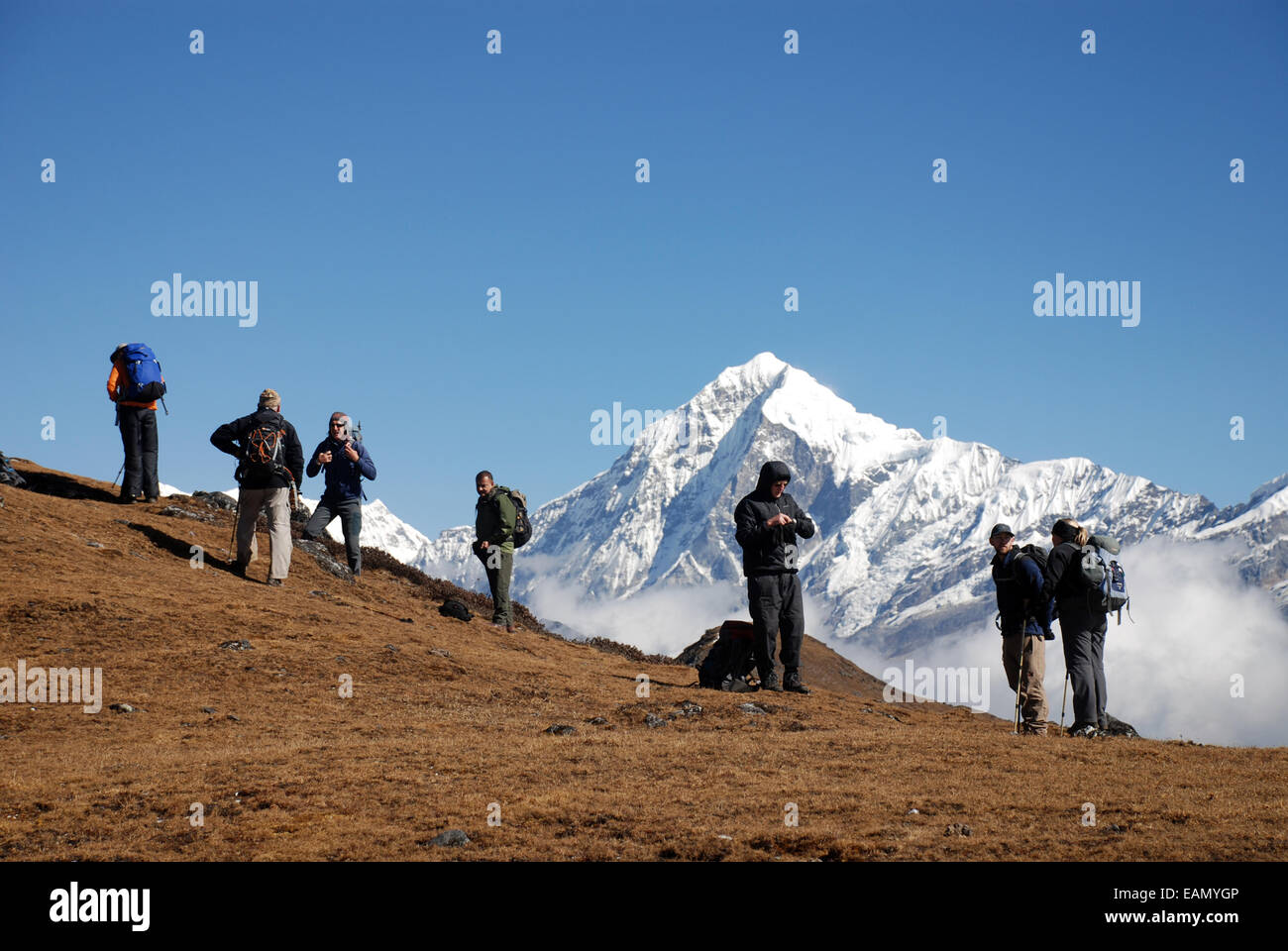 trekkers on a high point on the Singalila ridge in the Indian Himalayas Stock Photo