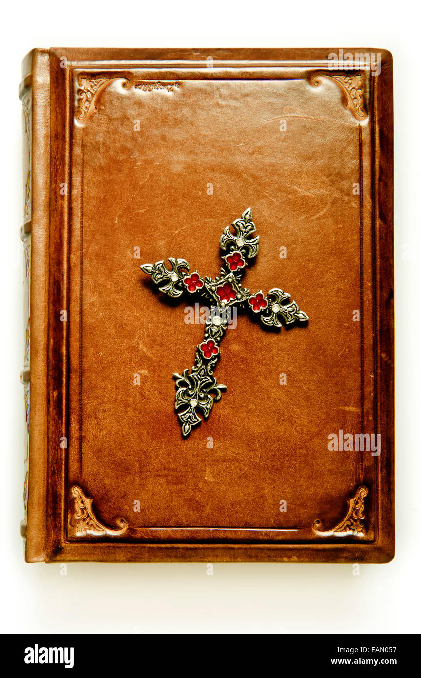 antique book with a Gothic cross, isolated Stock Photo