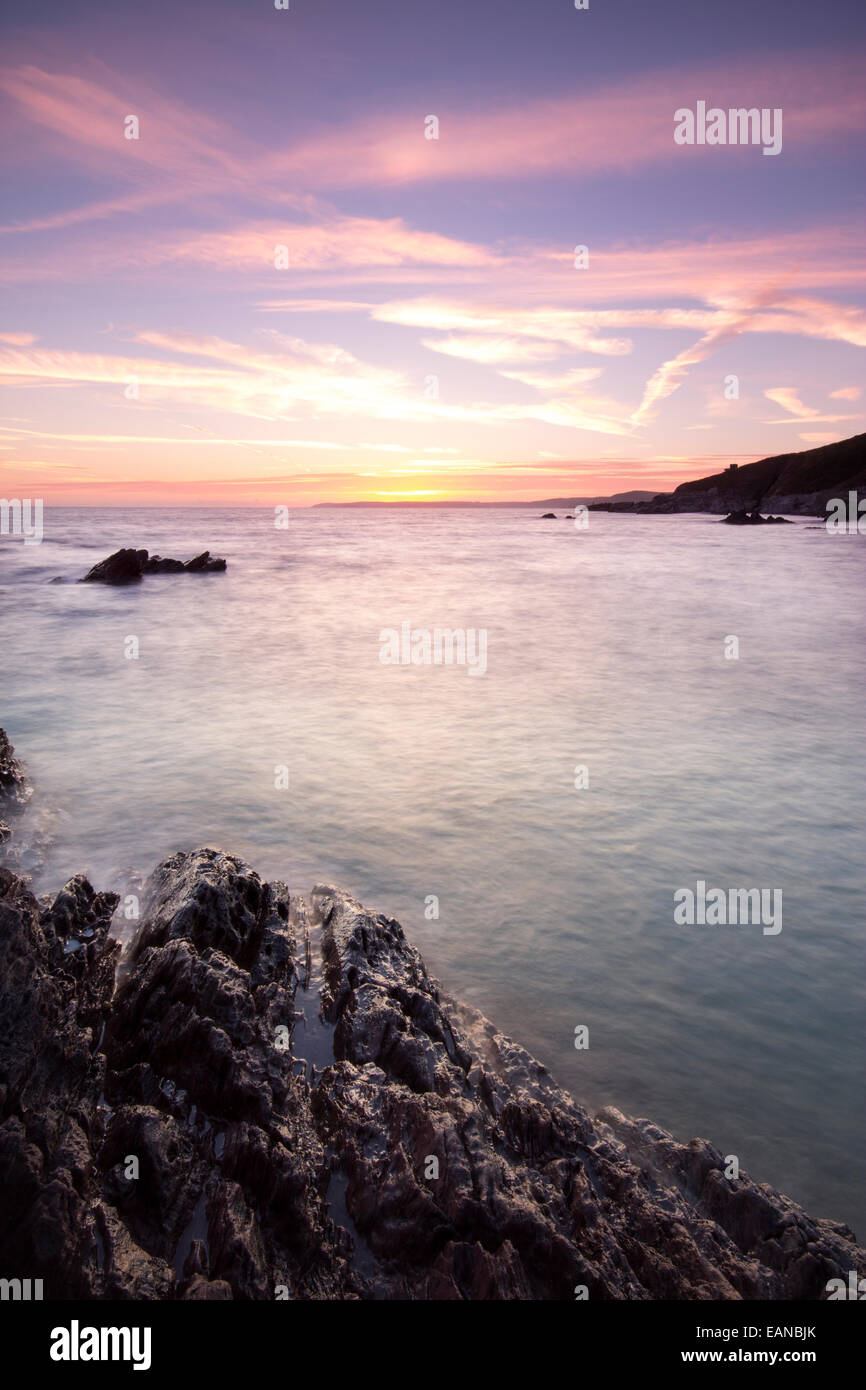 Sunset over Freathy Beach Whitsand Bay Cornwall UK Stock Photo