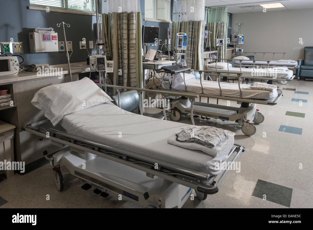 Multiple Beds In Hospital Recovery Room Stock Photo