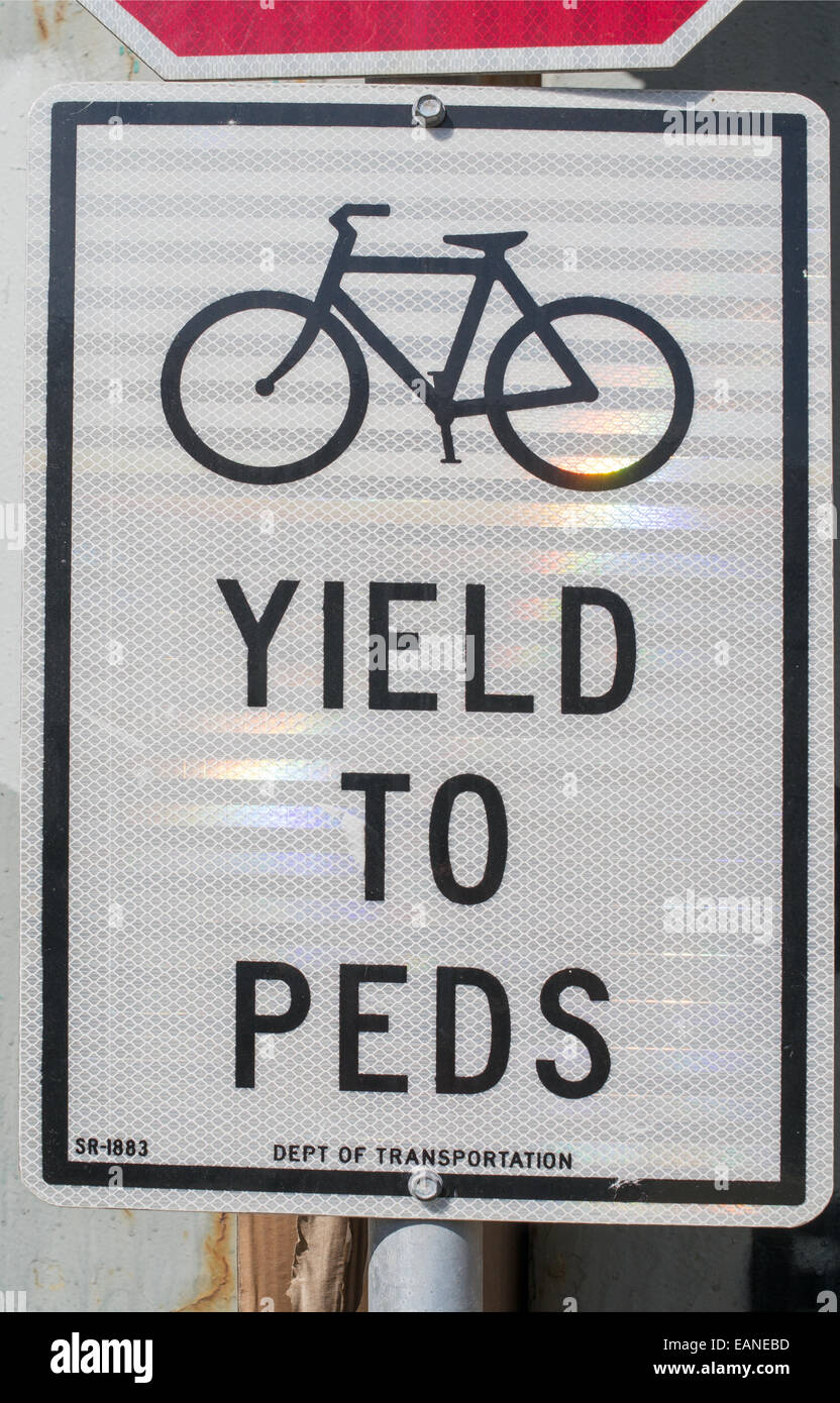 Cycling sign Yield to Peds Manhattan, New York, USA Stock Photo