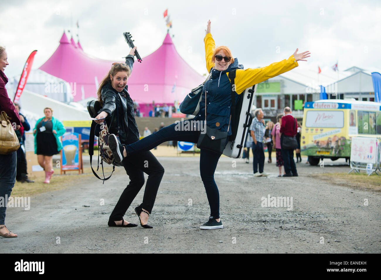 Two happy young women musicians at the National Eisteddfod of Wales, Llanelli, August 2014 Stock Photo