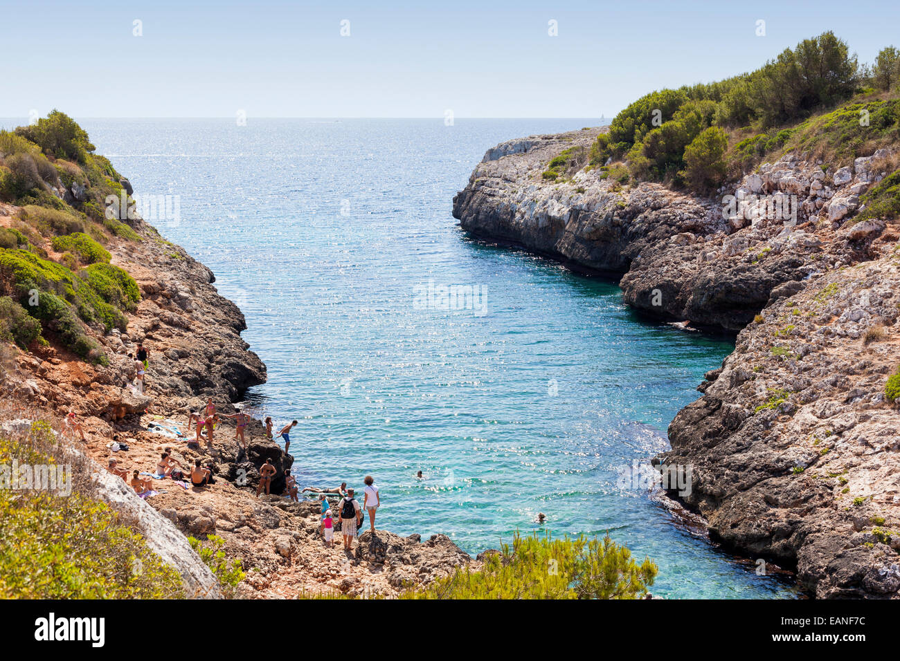 Swimmers enjoying at a cove in Majorca during summer Stock Photo