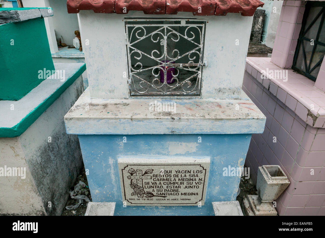 Blue painted Christian grave with grave lamp in the Champoton Cemetery, Champoton,  Mexico Stock Photo