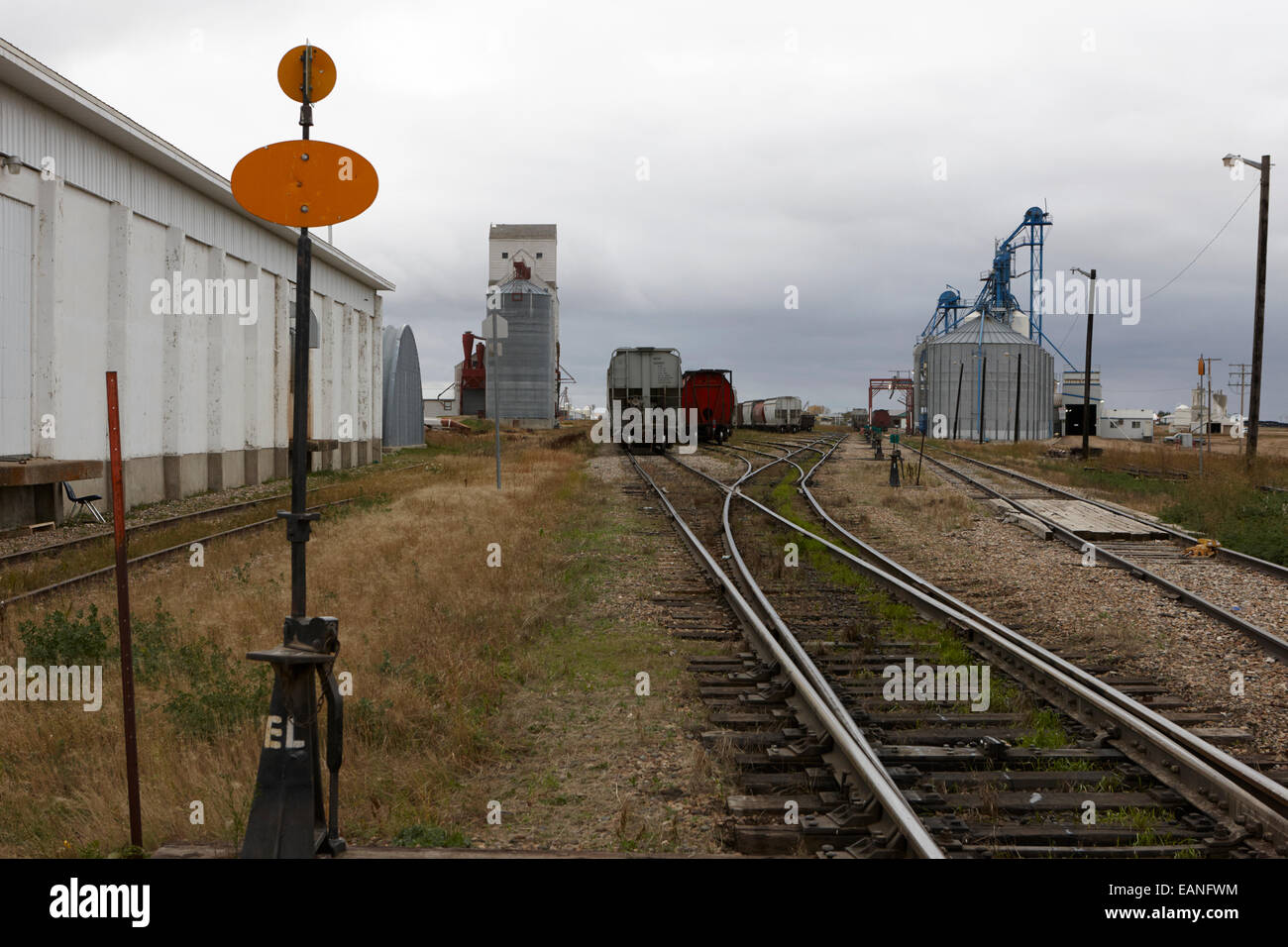 railway line approaching grain loading railway yard assiniboia Saskatchewan Canada Stock Photo