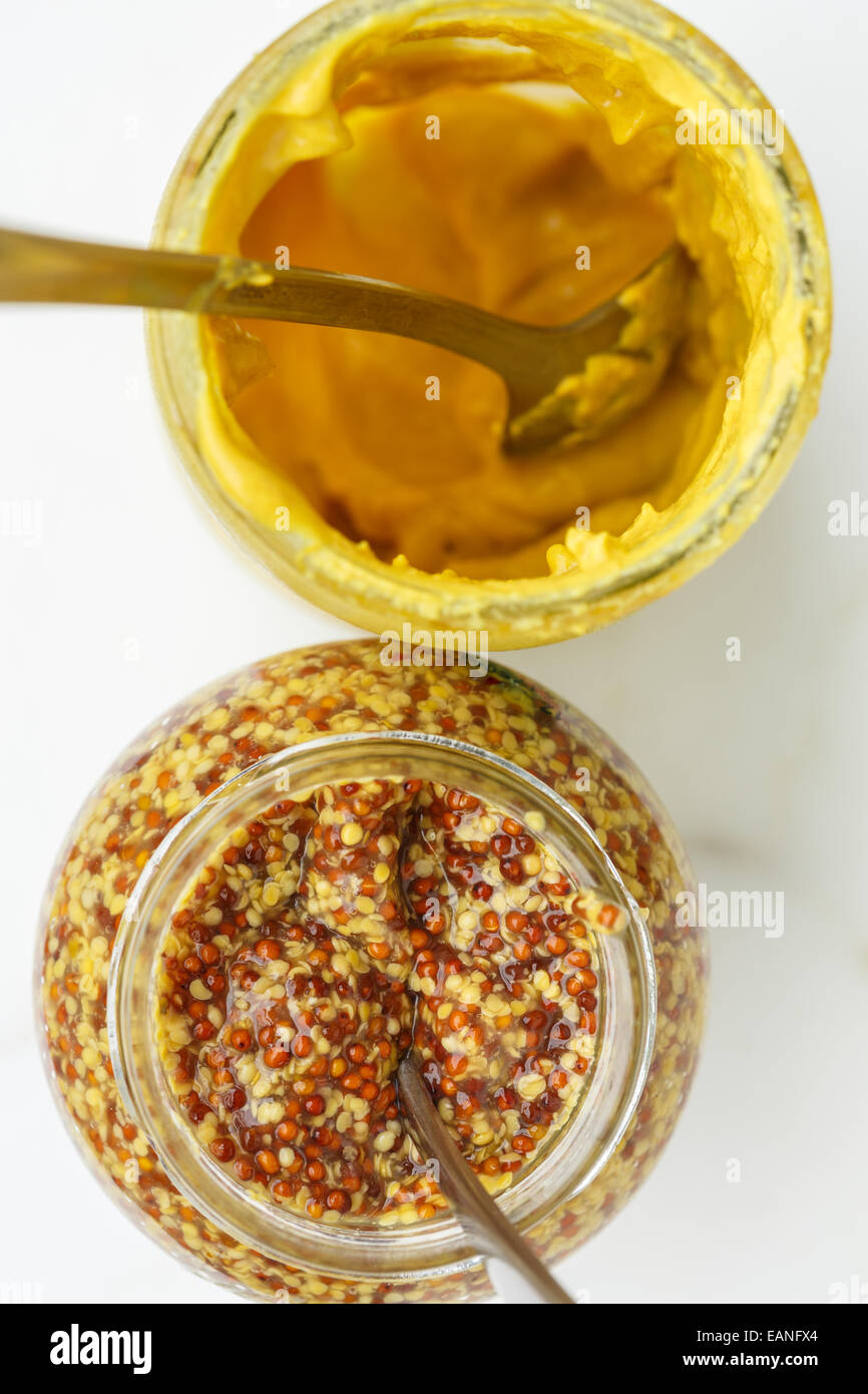 Dijon Mustard sauce and grain Stock Photo Alamy