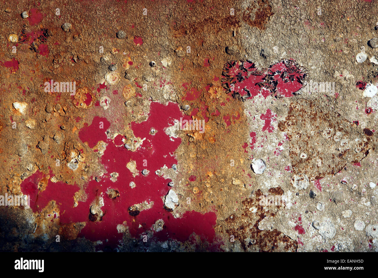 Old paint flaking on rusty corroding steel, closeup texture detail Stock Photo