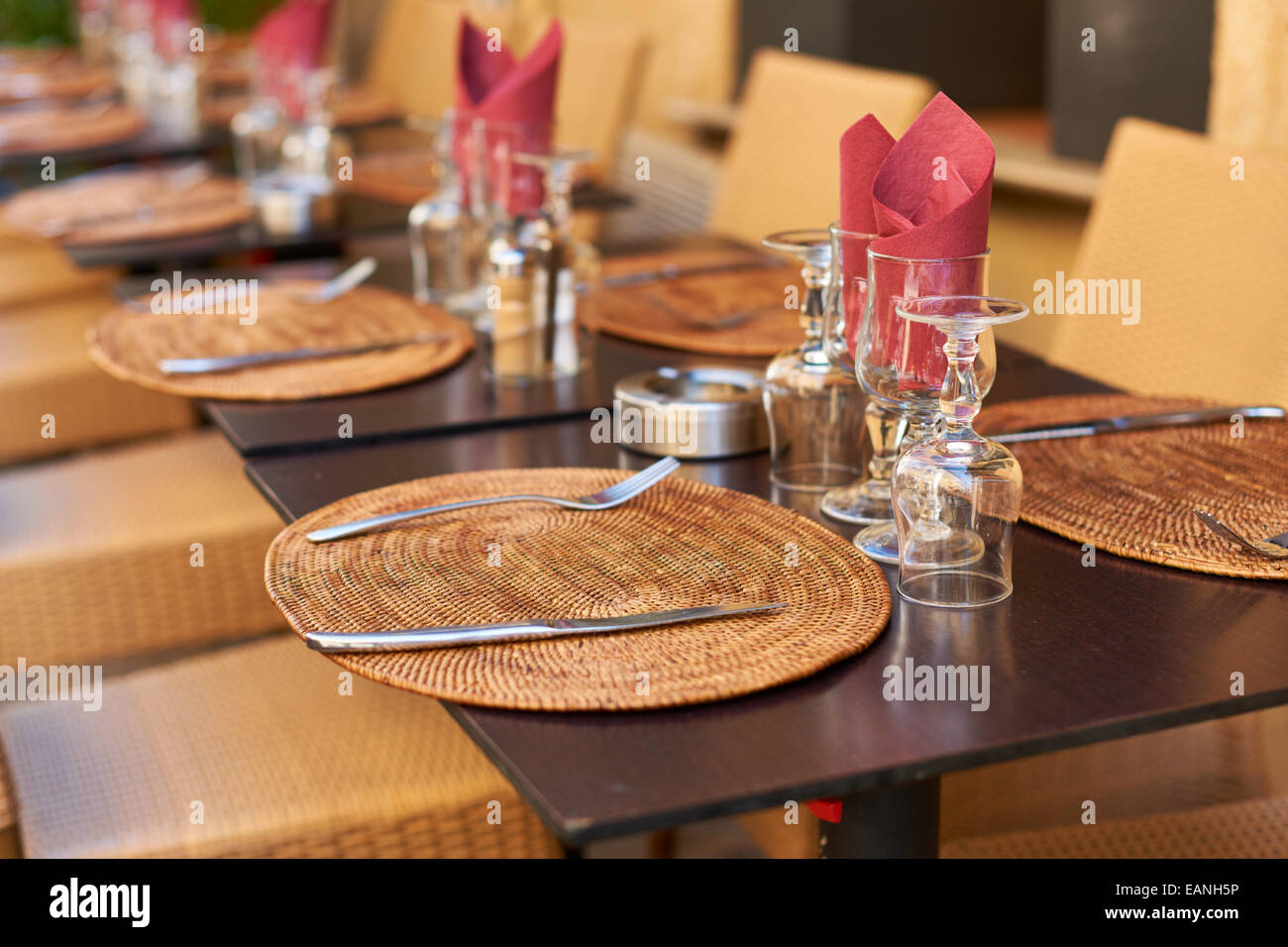 Table in small street restaurant in Aix en Provence town, South France Stock Photo