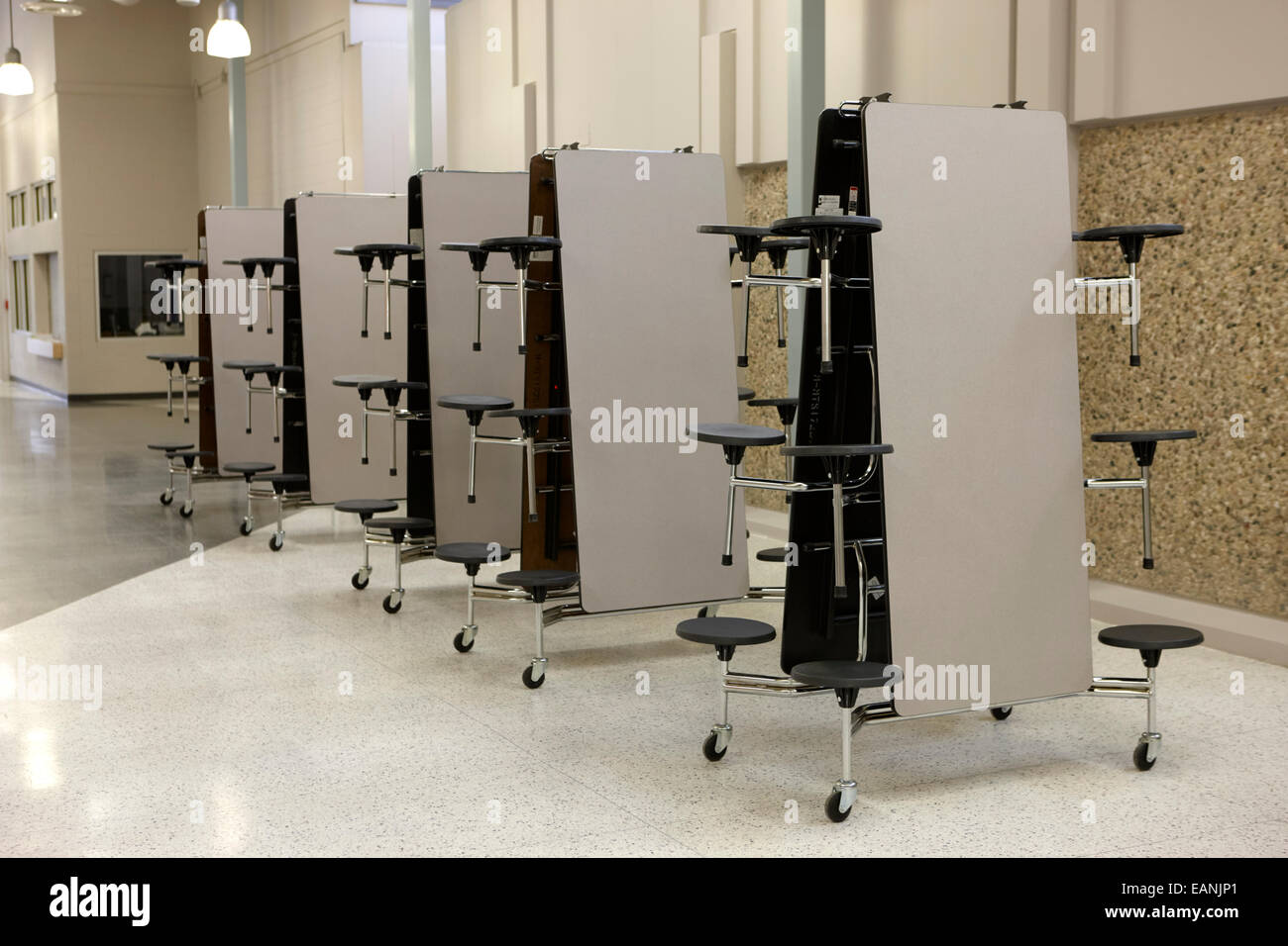 mobile folding table canteen dining units in a high school Stock Photo