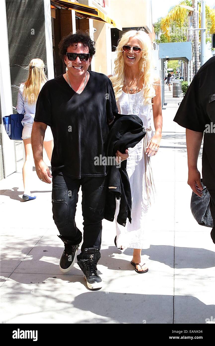 Neal Schon of Journey and wife Michaele Salahi leave Giuseppe Franco Salon  in Beverly Hills Featuring: Neal Schon,Michaele Salahi Where: Los Angeles,  California, United States When: 16 May 2014 Stock Photo - Alamy
