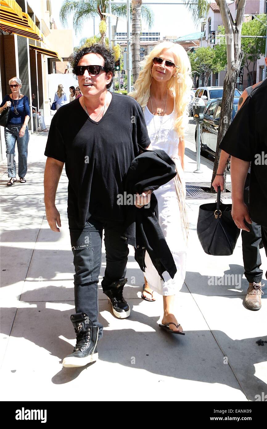 Neal Schon of Journey and wife Michaele Salahi leave Giuseppe Franco Salon  in Beverly Hills Featuring: Neal Schon,Michaele Salahi Where: Los Angeles,  California, United States When: 16 May 2014 Stock Photo - Alamy