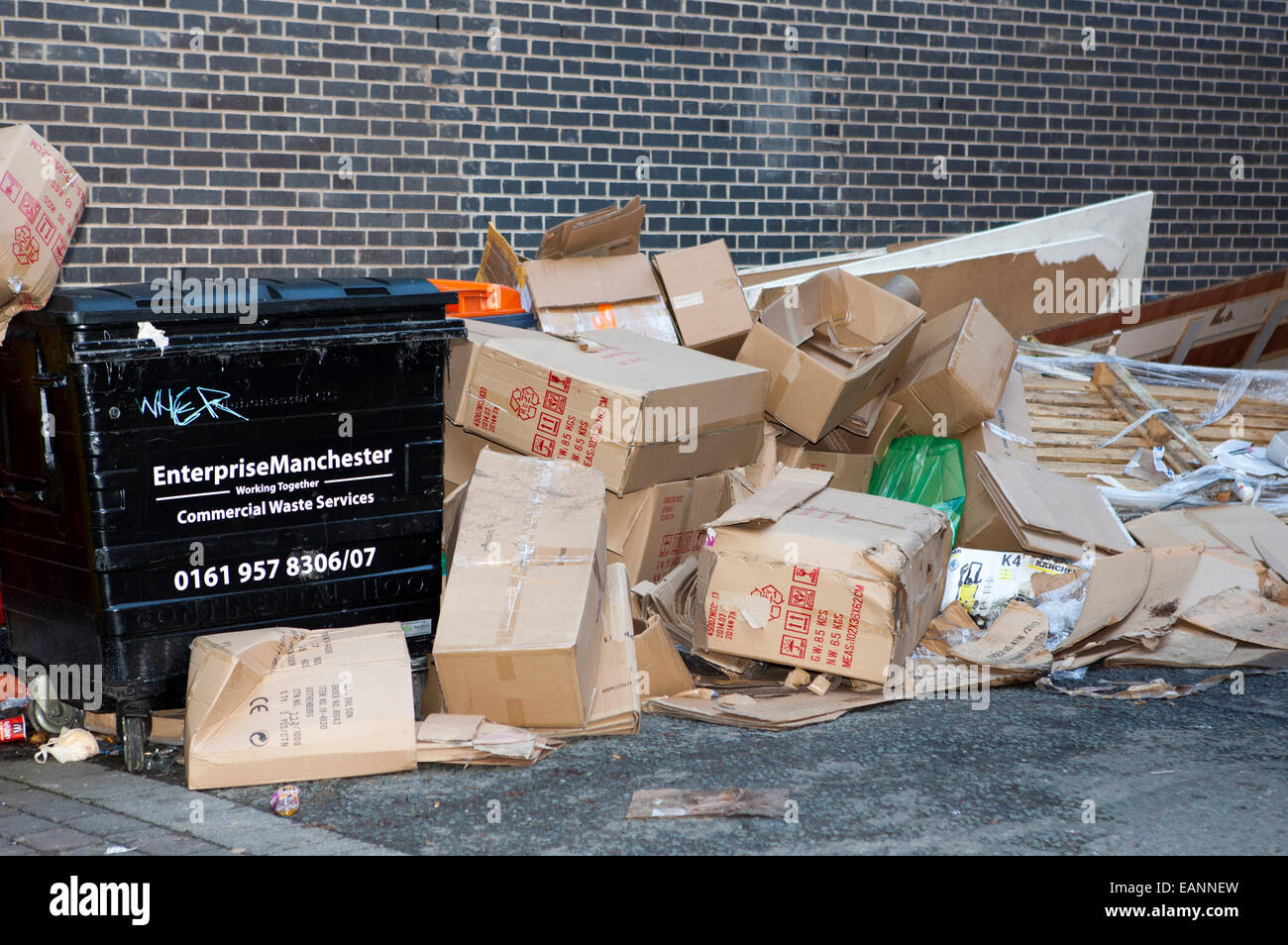 Cardboard boxes & general shop waste piled up at rear of Market Street