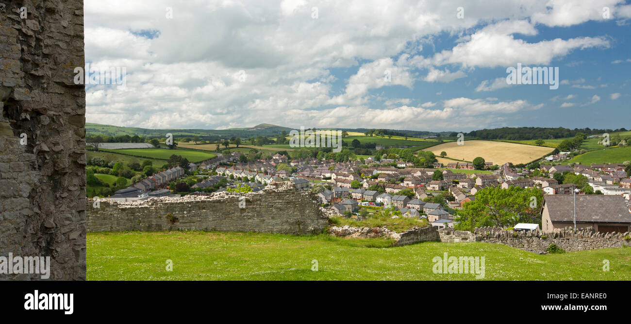 View, from hilltop castle, of historic Welsh town of Denbigh surrounded by emerald farmlands that stretch to low hills & horizon Stock Photo