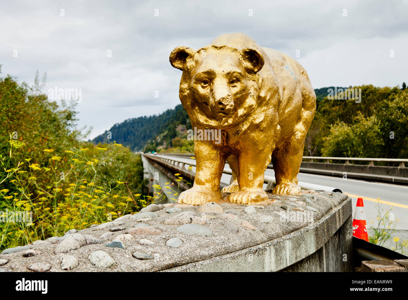 Golden bear on the bridge carrying Highway 101 over the Klamath River, California USA Stock Photo