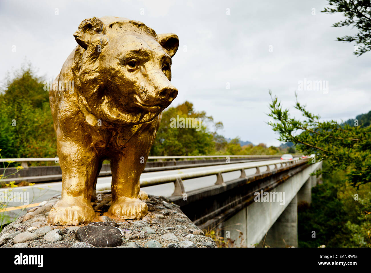 Golden bear on the bridge carrying Highway 101 over the Klamath River, California USA Stock Photo