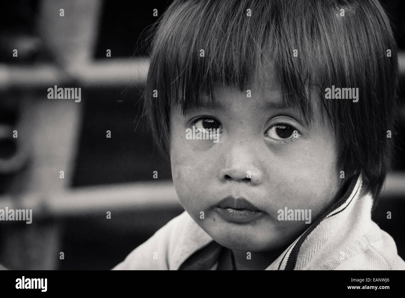 Young Lao child with a serious face Stock Photo