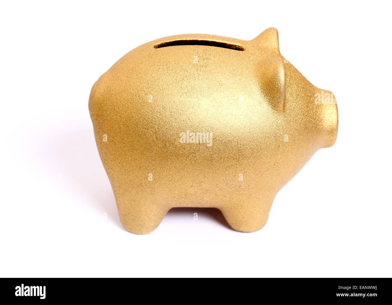 Golden piggy bank from right side, isolated Stock Photo Alamy