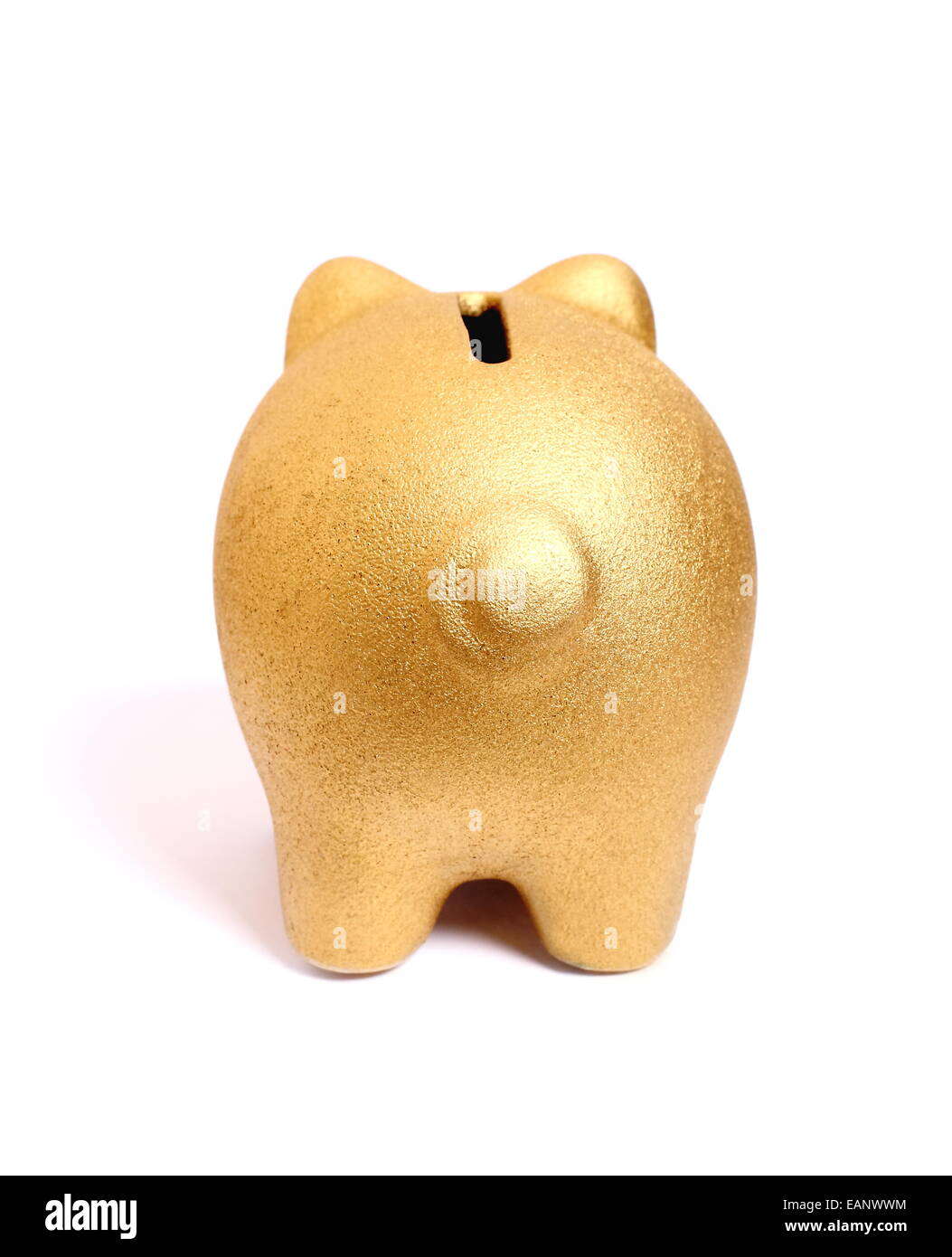 Golden piggy bank from back, isolated Stock Photo