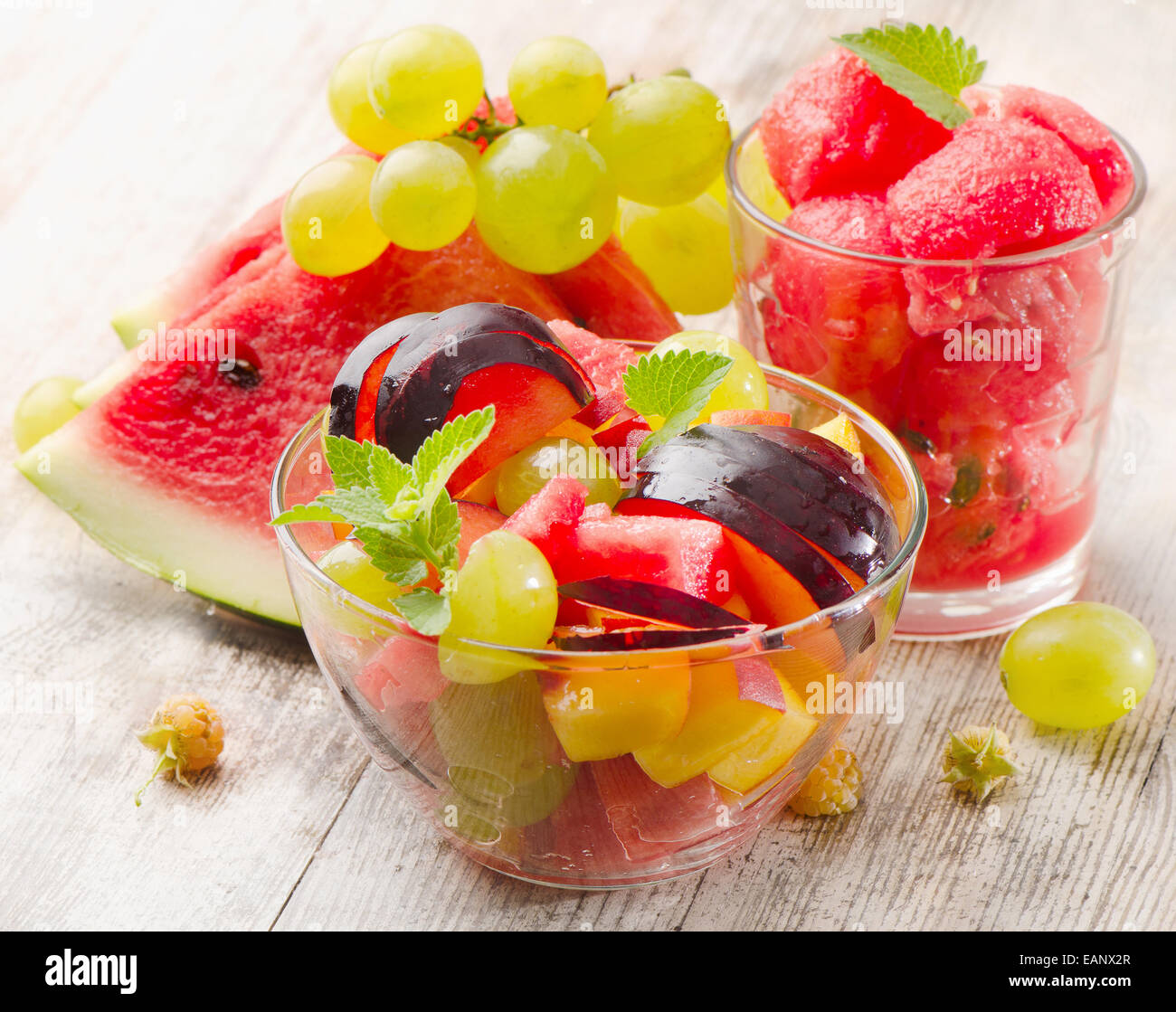 Fruit salad on wooden table. Selective focus Stock Photo