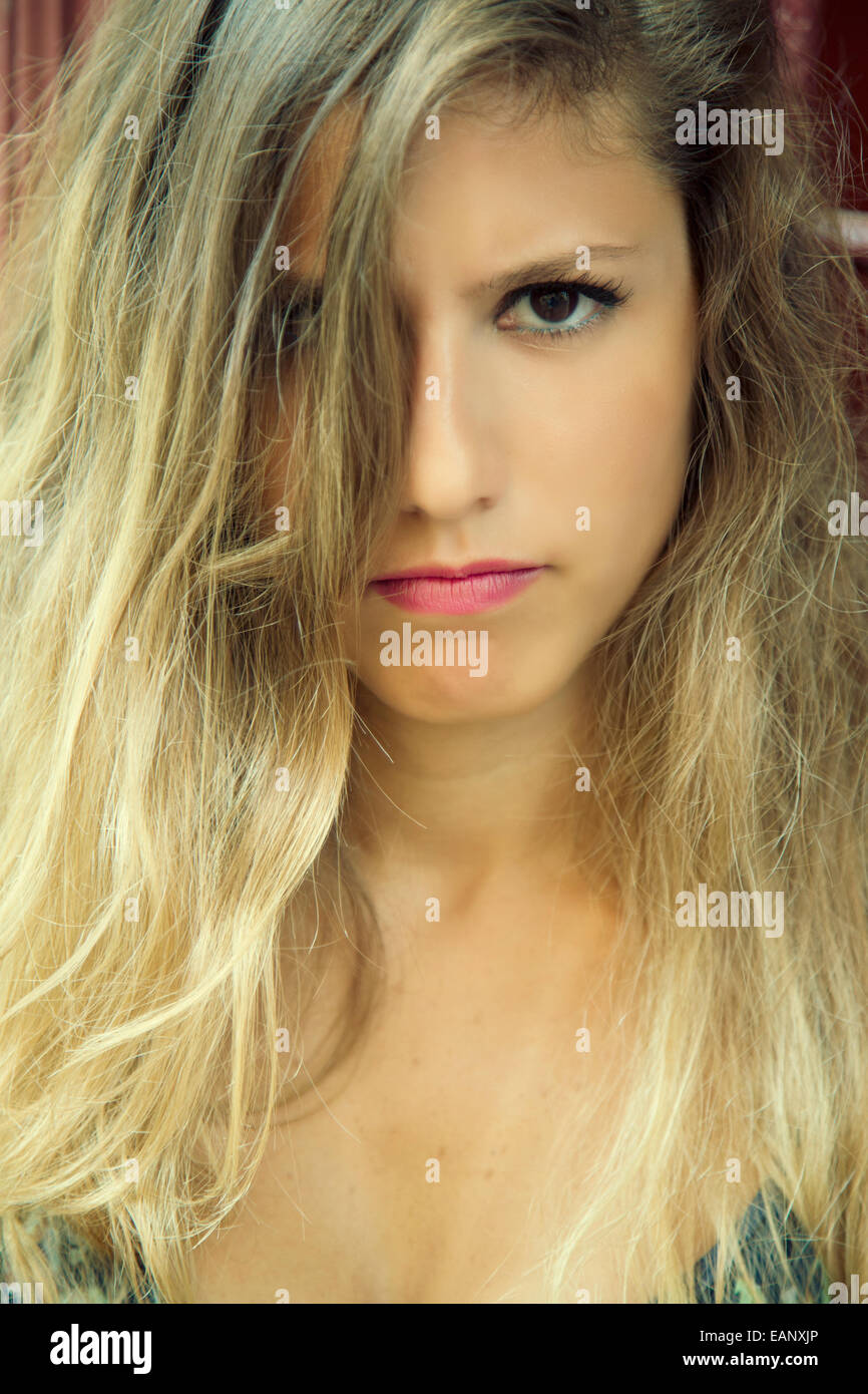 Angry young woman staring Stock Photo