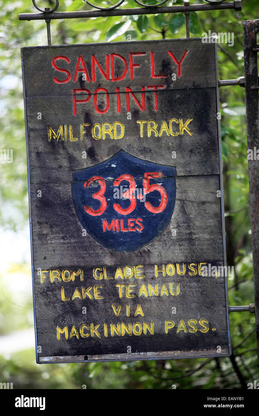 sign at Sandfly Point, the end of the Milford Track in Milford Sound, New Zealand Stock Photo
