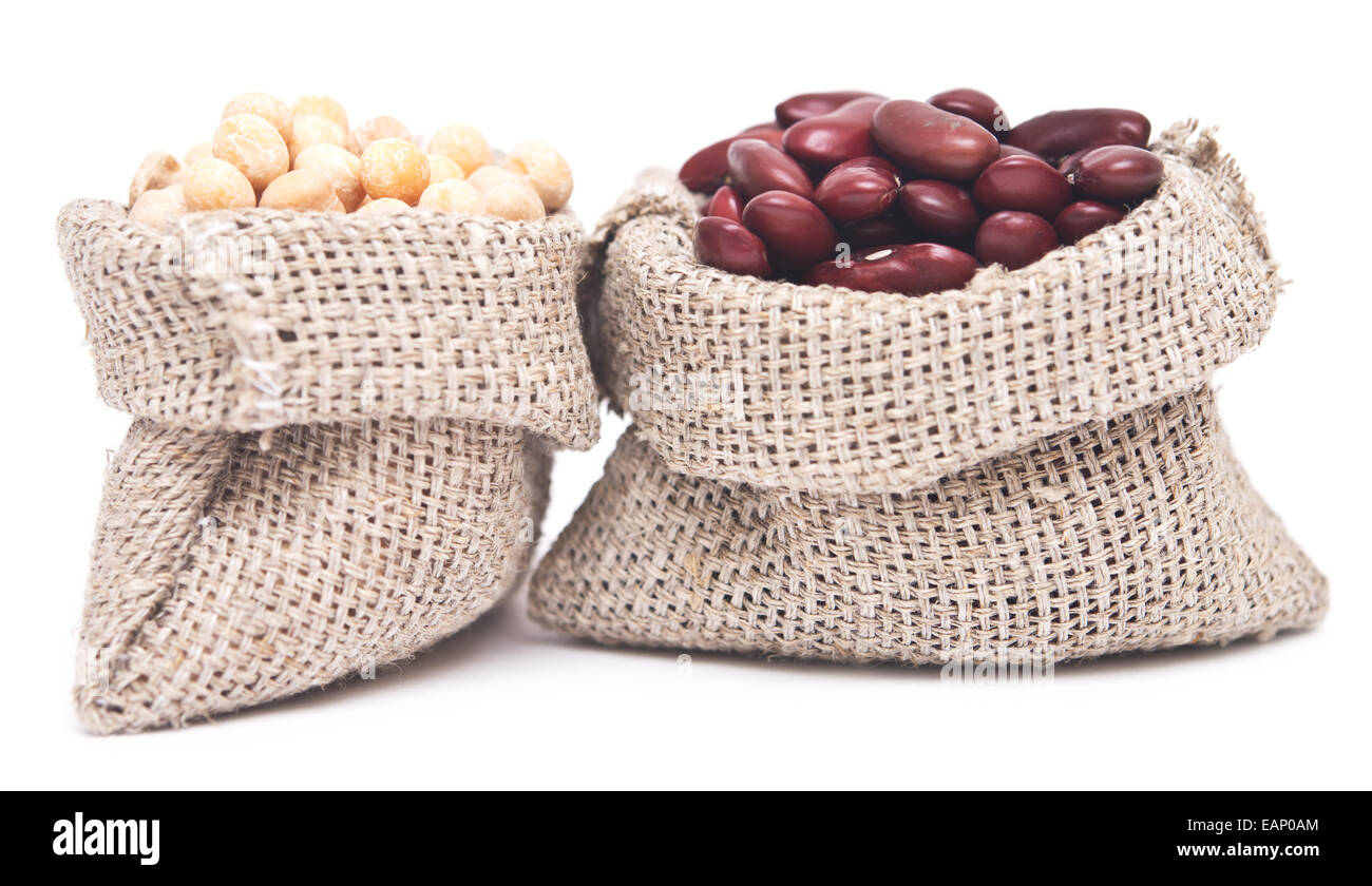 yellow peas and red kidney beans in a sack on white background Stock