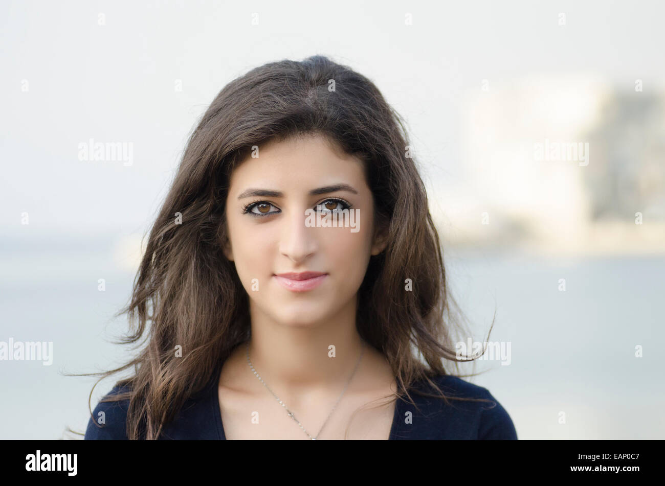 Beautiful young Middle Eastern woman outdoors Stock Photo