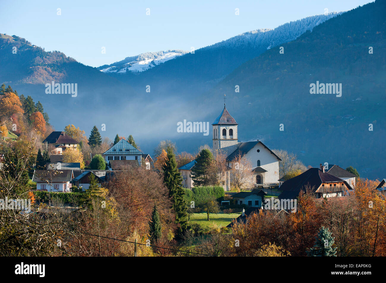 Marthod, Val D'Arly, Savoie, France. 19th November, 2014. Mist rises as the morning warms up after a cold night. After several days of rainy weather at low altitude and Snow at high altitude the morning breaks with a clear blue sky. Credit:  Graham M. Lawrence/Alamy Live News. Stock Photo