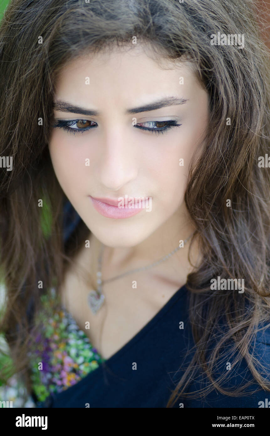Beautiful Middle eastern woman looking away Stock Photo