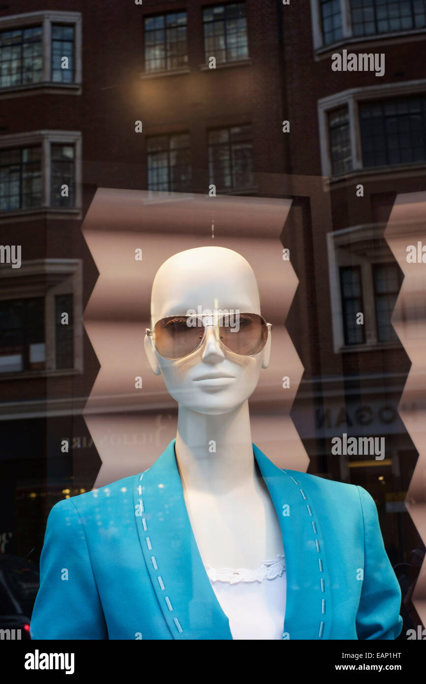 mannequin in fashion store windows Sloane Street London England UK Stock Photo