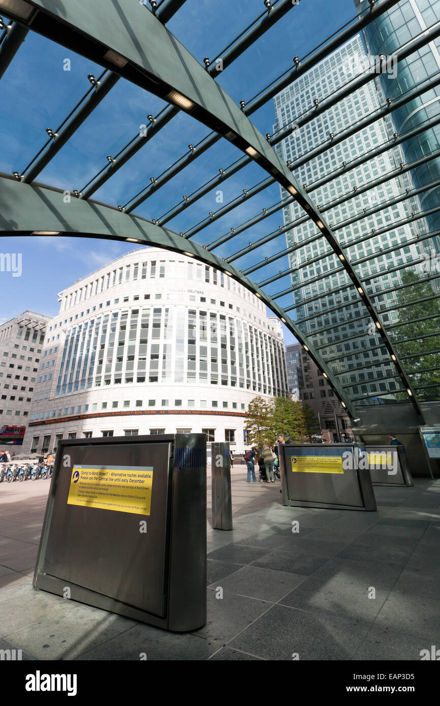 Wide-Angle view looking from   the entrance of Canary Wharf Station towards the  Thomson  Reuters  Building. Stock Photo
