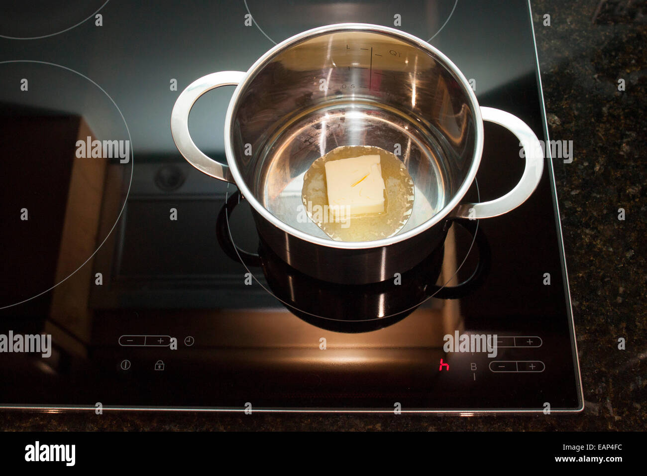 pan on induction hob Stock Photo Alamy