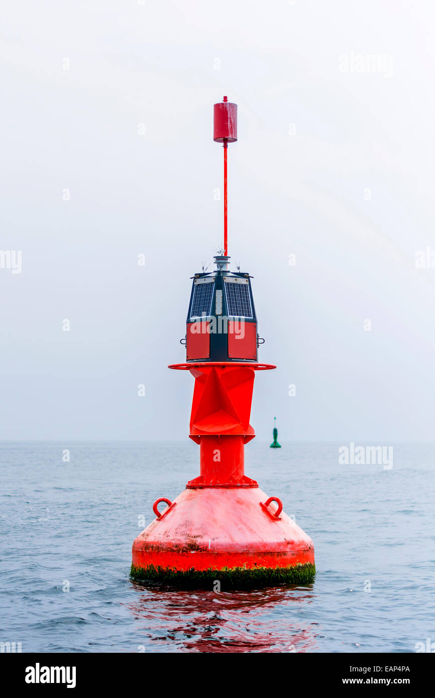 Red harbor entrance buoy Stock Photo