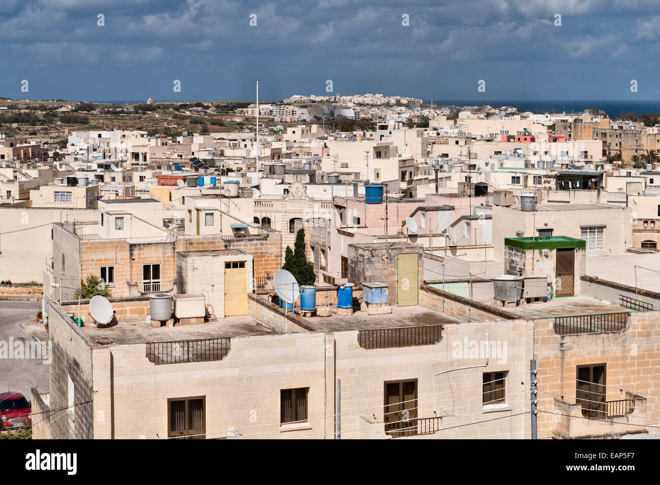 Zejtun, Malta. A rooftop view shows many houses with passive solar water heaters Stock Photo