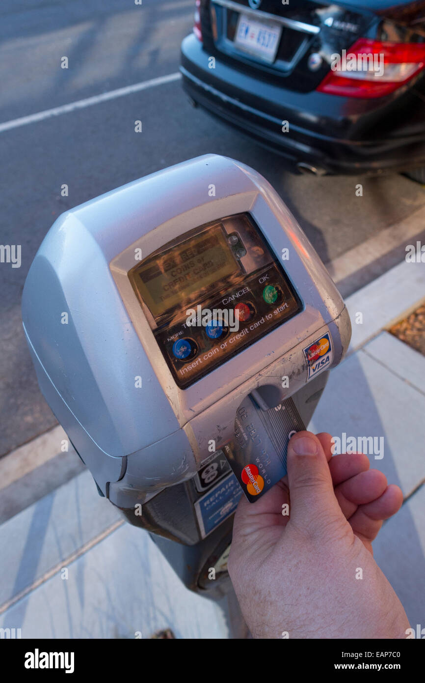 USA Paying a parking meter with a credit card no cash using a radio mesh network Stock Photo