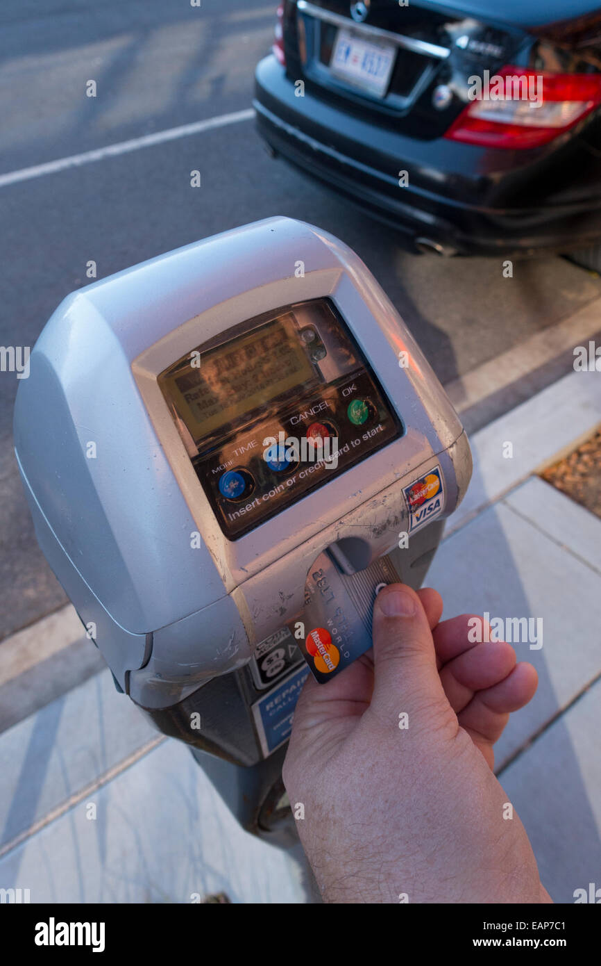 USA Paying a parking meter with a credit card no cash using a radio mesh network Stock Photo