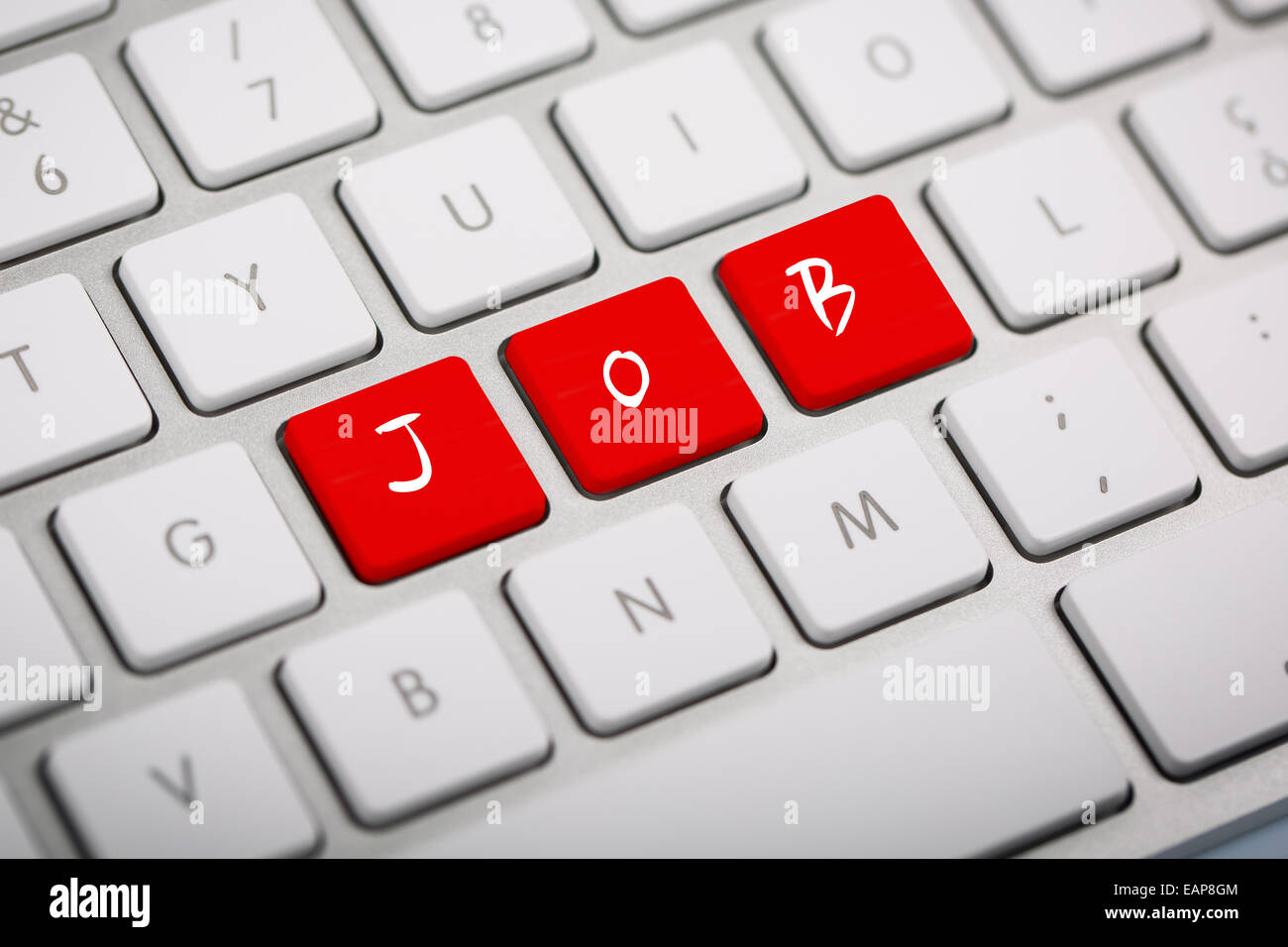 The word 'JOB' written on metallic keyboard Stock Photo